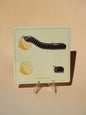 Lemon tasting millipede leather coaster