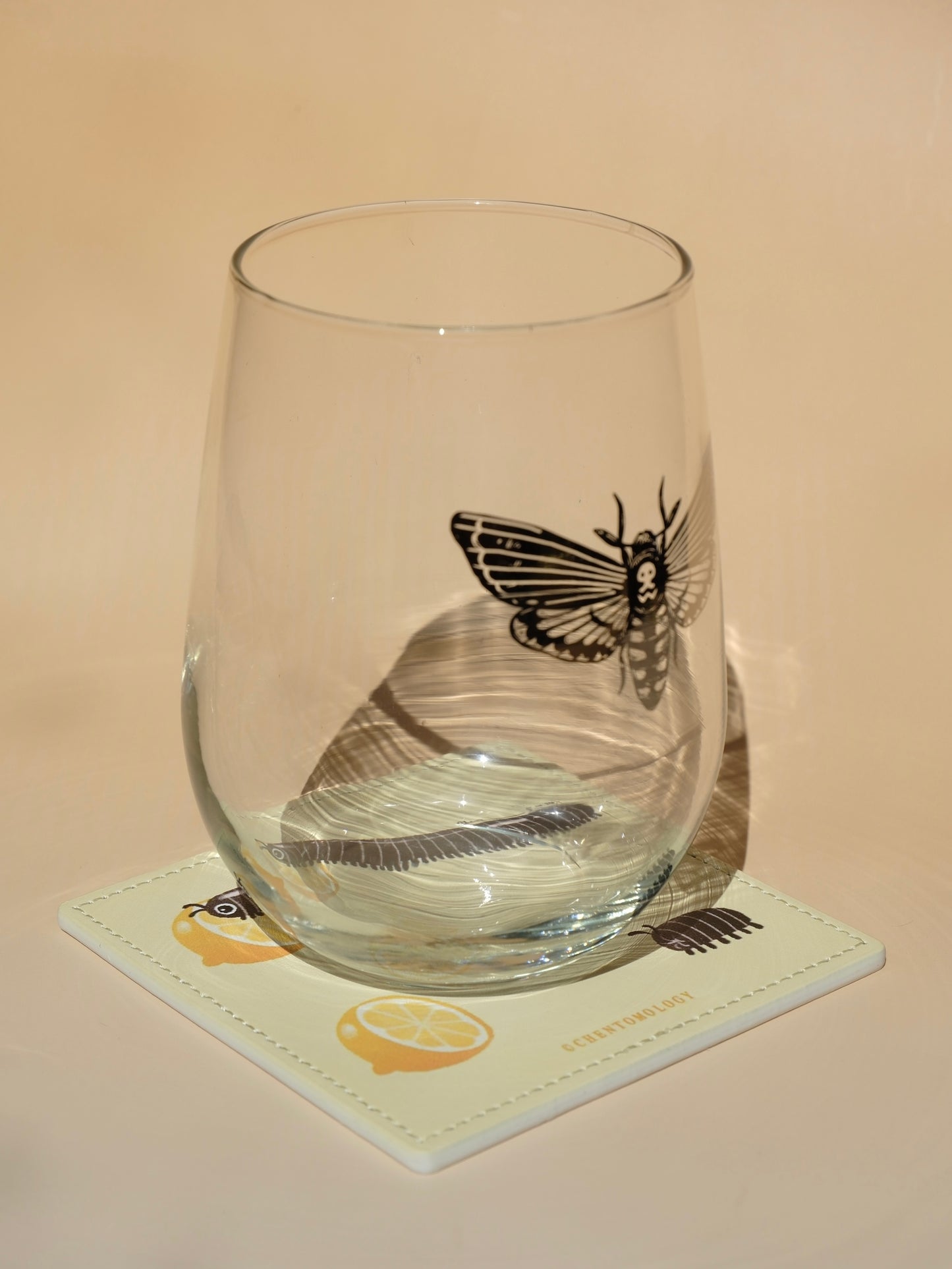 Lemon tasting millipede leather coaster